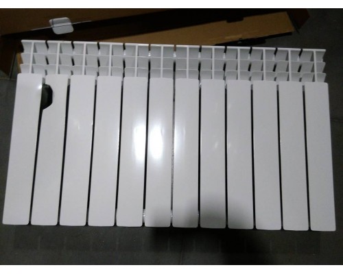 Уцененный товар (нарушена упаковка, скол ламели): Радиатор биметаллический ROMMER Plus BM 500 12 секций боковое подключение (RAL9016) RBM-3210-050012 (RBM-3210-050012)