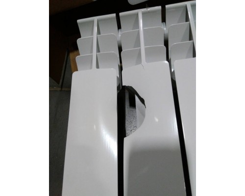 Уцененный товар (нарушена упаковка, скол ламели): Радиатор биметаллический ROMMER Plus BM 500 12 секций боковое подключение (RAL9016) RBM-3210-050012 (RBM-3210-050012)